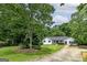 Well-maintained front yard with mature landscaping and a charming one-story home at 40 Salem Ct, Mcdonough, GA 30252