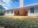Backyard featuring a covered patio along the rear of a home at 6190 Winston Trce, Mcdonough, GA 30252
