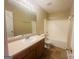 Single sink bathroom featuring a shower-tub combo and tiled floors at 6190 Winston Trce, Mcdonough, GA 30252