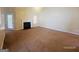 Spacious living room featuring a cozy fireplace and natural light at 6190 Winston Trce, Mcdonough, GA 30252