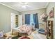 Light and airy bedroom with modern closet and natural light at 871 Rocky Creek Rd, Hampton, GA 30228