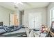 Neutral bedroom with closet, doorway, and window providing natural light at 871 Rocky Creek Rd, Hampton, GA 30228
