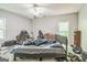 Bright bedroom with light-colored carpet and natural light at 871 Rocky Creek Rd, Hampton, GA 30228