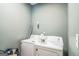Laundry room featuring a white washer and dryer at 871 Rocky Creek Rd, Hampton, GA 30228