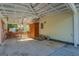 Covered carport area with an adjacent storage shed and steps leading to a back door at 3170 Butler Se Ave, Covington, GA 30014