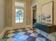 Inviting foyer features stylish decor, patterned flooring, and convenient access to the home's interior spaces at 3170 Butler Se Ave, Covington, GA 30014