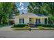 Charming one-story home featuring a covered porch, manicured lawn, carport, and a well-maintained exterior at 3170 Butler Se Ave, Covington, GA 30014
