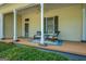 Charming front porch with seating creates a welcoming entrance and adds character to this well-maintained home at 3170 Butler Se Ave, Covington, GA 30014