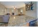 This inviting living area is complete with an island and fireplace at 3170 Butler Se Ave, Covington, GA 30014