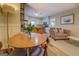 Open-concept living area featuring hardwood floors, dining area and a cozy seating arrangement at 3170 Butler Se Ave, Covington, GA 30014