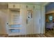 A spacious, all-white wardrobe with shelving and storage at 3170 Butler Se Ave, Covington, GA 30014