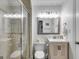 Full bathroom with a glass shower enclosure at 705 Berry Ct, Villa Rica, GA 30180