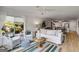 Cozy living room with wicker chairs and an inviting decor at 705 Berry Ct, Villa Rica, GA 30180