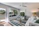 Bright living room with waterfront views and a striped rug at 705 Berry Ct, Villa Rica, GA 30180