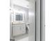 This updated bathroom boasts modern vanity and a view of the toilet at 8500 Bowen Ct, Jonesboro, GA 30238