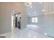 Open floorplan featuring marble floors, neutral paint, recessed lighting and kitchen and living spaces at 8500 Bowen Ct, Jonesboro, GA 30238