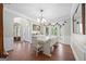 Dining room featuring a white table and chairs plus a large window for natural lighting at 1130 S Rudder Rd, Cumming, GA 30041