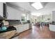 Spacious kitchen featuring granite countertops, modern appliances, with dining area in view at 1130 S Rudder Rd, Cumming, GA 30041