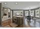Modern kitchen with stainless appliances and a large island with seating at 120 Laurel Forest Dr, Tyrone, GA 30290