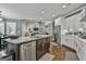 Spacious kitchen with granite countertops, stainless steel appliances and an island with seating at 120 Laurel Forest Dr, Tyrone, GA 30290