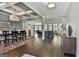 Open floor plan featuring coffered ceilings and hardwood floors at 120 Laurel Forest Dr, Tyrone, GA 30290
