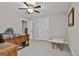 A stylish office featuring a ceiling fan and a carpet floor at 120 Laurel Forest Dr, Tyrone, GA 30290