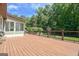 Expansive back deck providing ample outdoor living space with a view of the backyard at 411 Baneberry Bnd, Peachtree City, GA 30269