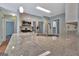 Well-equipped kitchen with granite counters, stainless steel appliances, and ample lighting, ready for culinary adventures at 411 Baneberry Bnd, Peachtree City, GA 30269