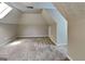 Spacious bedroom featuring skylight, neutral paint and plush carpeting at 1311 Bustling Sw Ln, Marietta, GA 30064