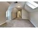 Cozy bedroom with plush carpeting, textured ceiling, and lots of natural light at 1311 Bustling Sw Ln, Marietta, GA 30064