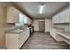 Modern kitchen featuring white cabinets, stainless steel appliances and updated countertops at 1311 Bustling Sw Ln, Marietta, GA 30064