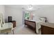 Bedroom featuring a ceiling fan, natural light and a cozy, relaxing atmosphere at 115 Roscommon Ct, Tyrone, GA 30290
