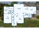 Detailed floor plan of the home's first floor, showcasing the layout of the living room, kitchen, and bedrooms at 115 Roscommon Ct, Tyrone, GA 30290