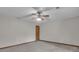 Bedroom with ceiling fan, neutral walls, and carpet flooring at 886 Pine Needle Rd, Hampton, GA 30228