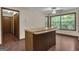 Bonus room with hardwood style floors and a ceiling fan at 886 Pine Needle Rd, Hampton, GA 30228