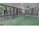 Covered back porch overlooking a wooded backyard at 886 Pine Needle Rd, Hampton, GA 30228