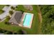 Aerial shot showcasing the community pool, featuring a covered area and nearby landscaping at 162 Aylesbury Blvd, Mcdonough, GA 30252