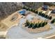 Community pool and playground amenities, with parking, landscaping, and surrounding homes at 162 Aylesbury Blvd, Mcdonough, GA 30252