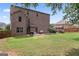 Expansive backyard featuring a lush green lawn, patio area, and well-kept landscaping at 162 Aylesbury Blvd, Mcdonough, GA 30252