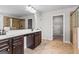 Bathroom with dual vanity, walk-in shower and separate entrances to closet at 162 Aylesbury Blvd, Mcdonough, GA 30252