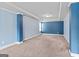 Large bedroom featuring two-tone walls, tray ceiling and plush carpeting at 162 Aylesbury Blvd, Mcdonough, GA 30252