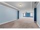 Massive bedroom with neutral carpet, tray ceiling and lots of natural light at 162 Aylesbury Blvd, Mcdonough, GA 30252