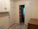 Functional laundry room features ample storage and practical design at 18 North Ave, Hampton, GA 30228