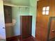 Storage area with shelving and a cabinet, providing ample space for organization at 18 North Ave, Hampton, GA 30228