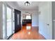 Inviting foyer with hardwood floors, open view to living room, and welcoming ambiance at 1621 Dixie Rd, Covington, GA 30014