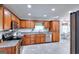 Well-equipped kitchen featuring stainless steel appliances, granite countertops, and ample cabinet space at 1621 Dixie Rd, Covington, GA 30014