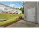 A view of a grassy backyard and storage shed at 1363 Penhurst Dr, Lawrenceville, GA 30043