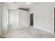 Bedroom with plush neutral carpet, ceiling fan, and closet at 1363 Penhurst Dr, Lawrenceville, GA 30043