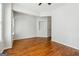 A bright living room with hardwood floors and neutral walls at 1363 Penhurst Dr, Lawrenceville, GA 30043