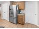 Kitchen featuring a stainless steel refrigerator, and tile flooring at 445 Royal St, Mcdonough, GA 30253